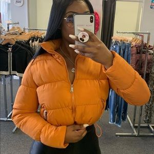 Cropped Orange puffer jacket with drawstring